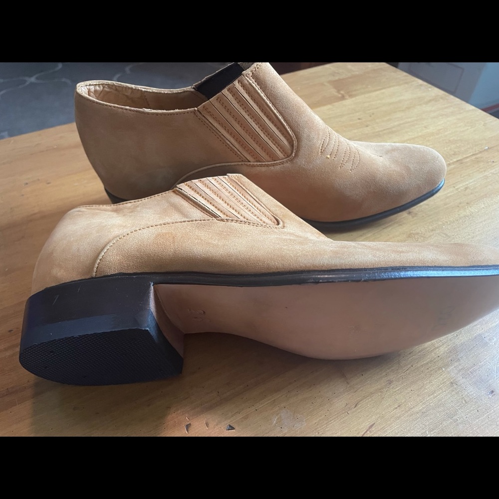 Brand new/never used CHAMULA booties.